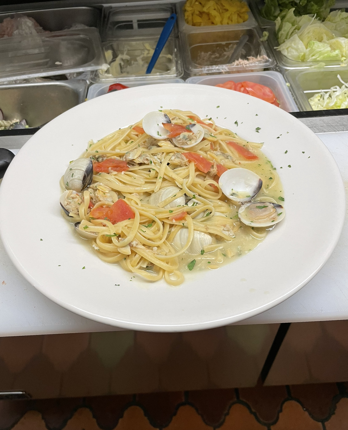 Order Linguini with White Clam Sauce  food online from Dino Italian Restaurant store, Wilkes-Barre on bringmethat.com