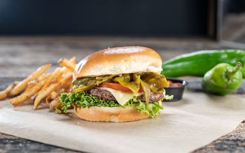 Order Green Chile Burger - Burger food online from Native Grill & Wings store, Phoenix on bringmethat.com