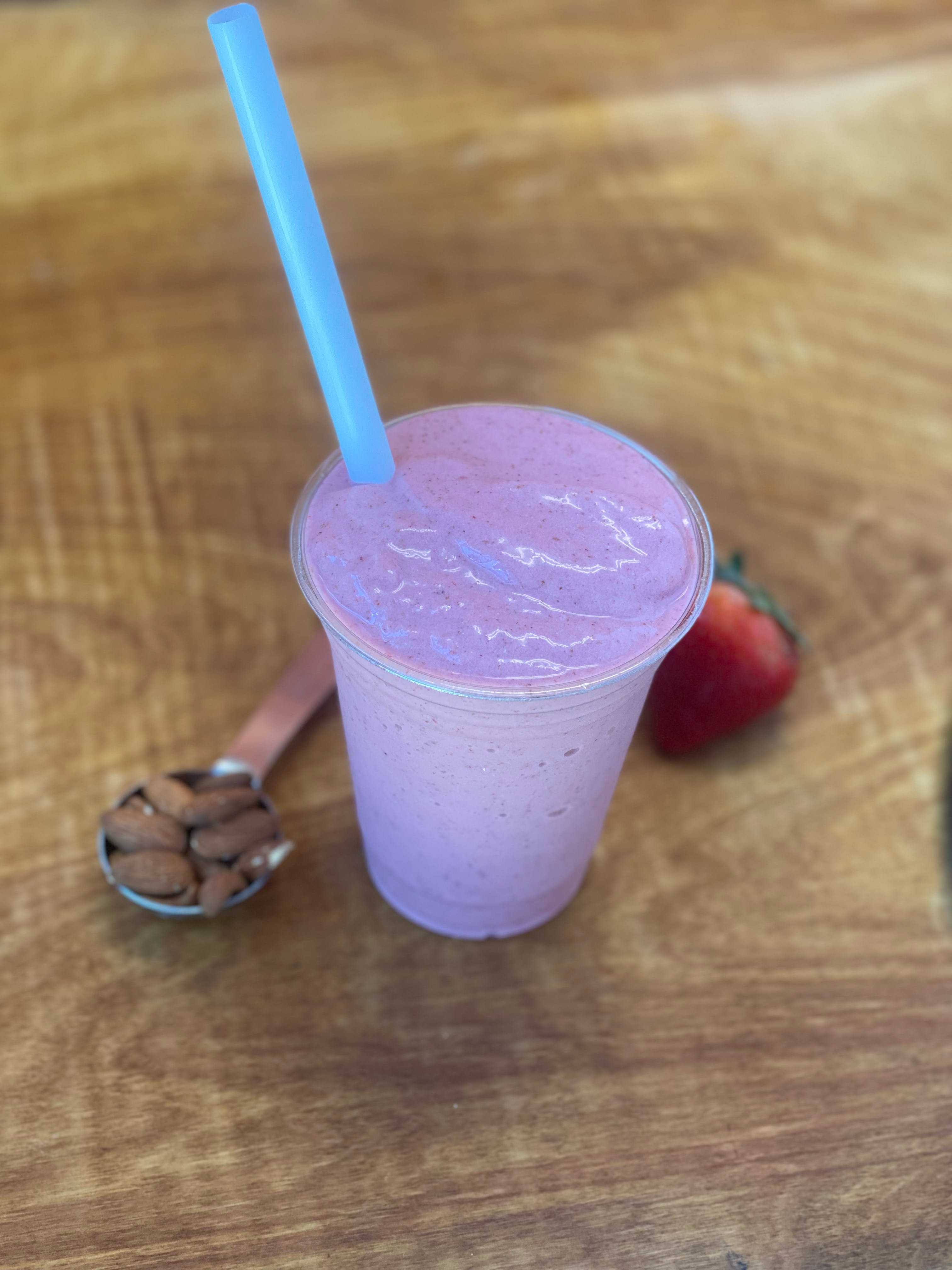 Order Almond-Della Strawberry Smoothie - Medium food online from Story's Pizza & Smoothies store, Dayton on bringmethat.com