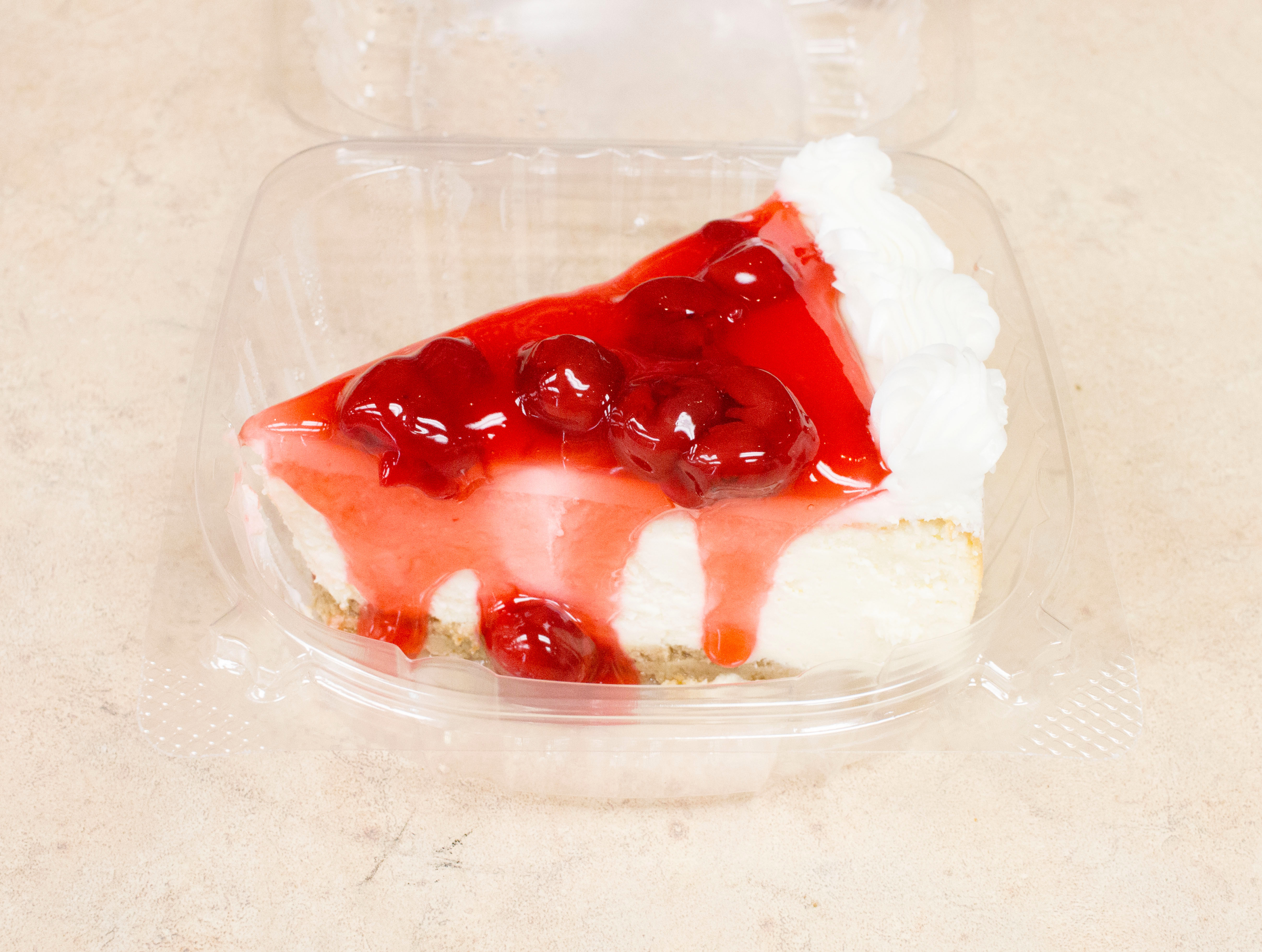 Order Cherry Cheese Cake Slice food online from Grapes And Hops Market store, Waterford on bringmethat.com