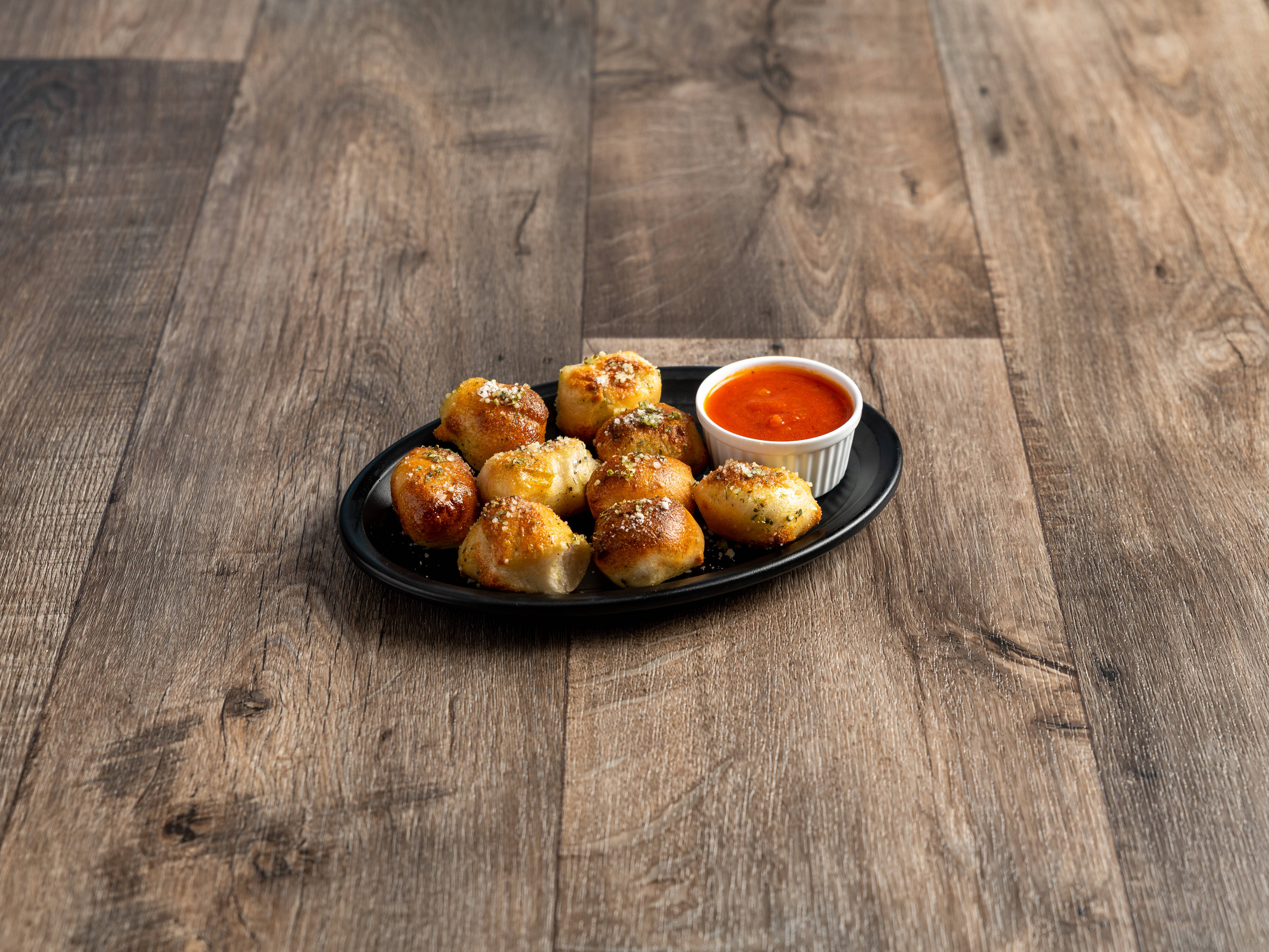 Order Garlic Knots food online from 204 Grill Pizza and Subs store, Virginia Beach on bringmethat.com
