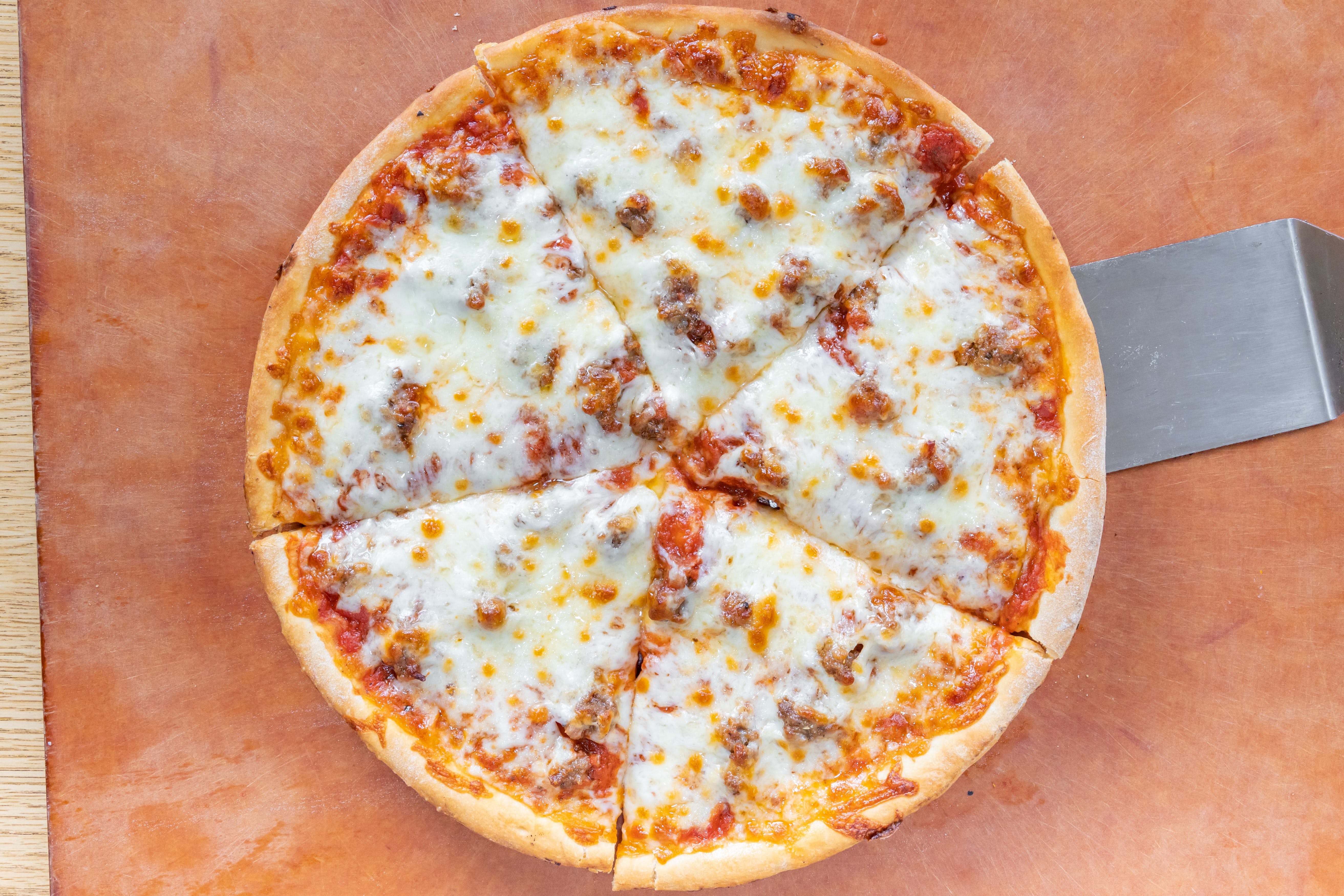 Order Deep Dish Cheese Pizza - Medium 12'' food online from Emilio's Pizza store, Burbank on bringmethat.com