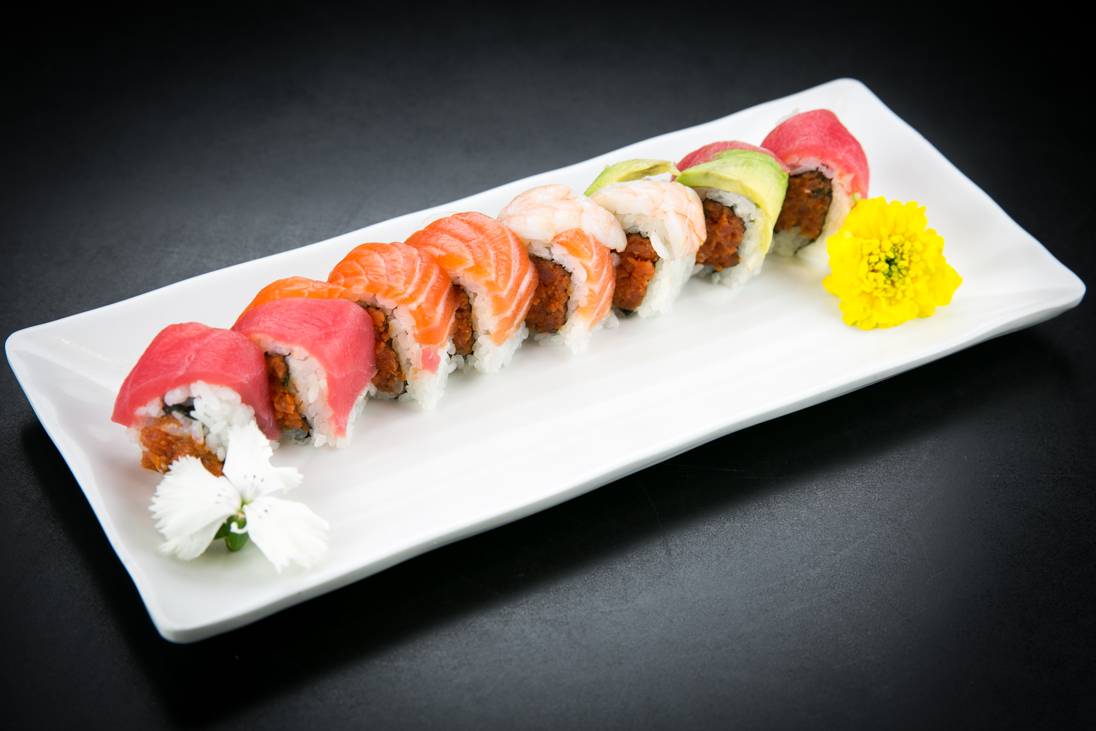 Order Spicy Yellow Tail Rainbow Roll  food online from Mansun Japanese Restaurant store, Walnut on bringmethat.com