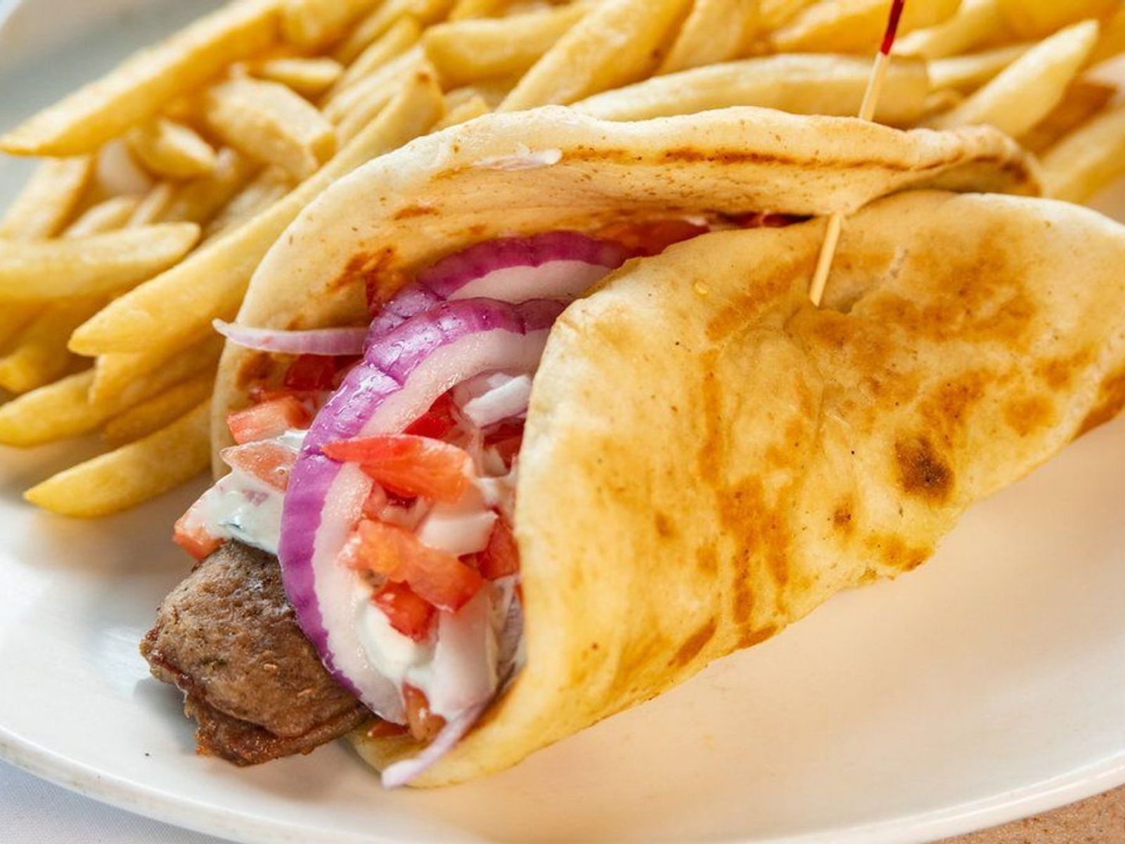 Order Gyro Dinner food online from Leo Coney Island store, Roseville on bringmethat.com