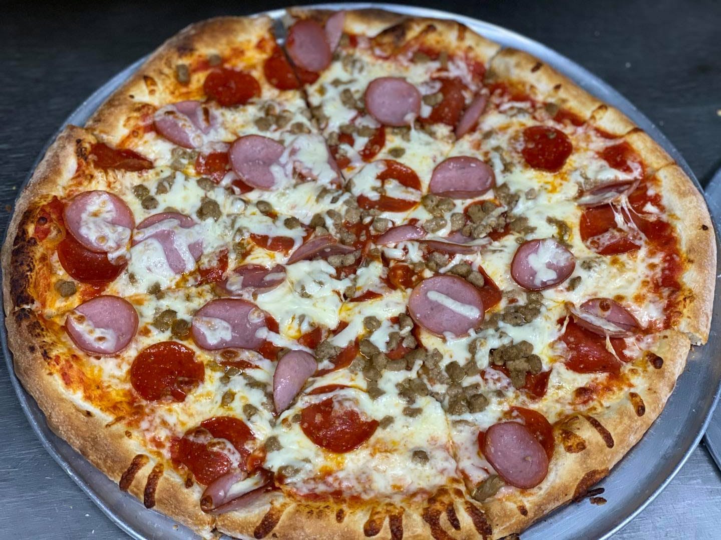 Order Mia's Meat Lovers Pizza - Small 12'' food online from Mia's Italian Bistro store, Wichita Falls on bringmethat.com