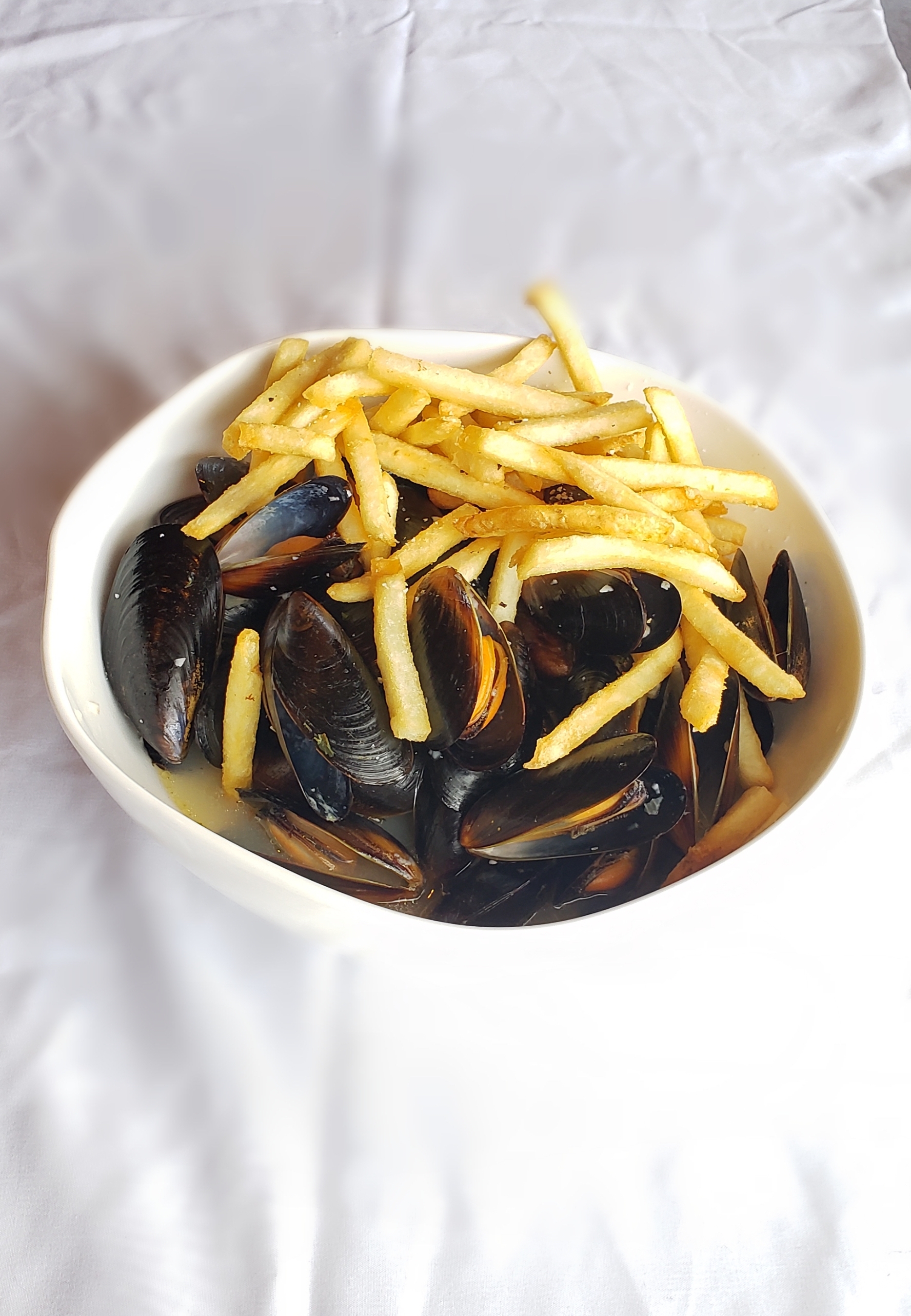Order Mussels & Fries in White Wine Sauce food online from Colorado Flatbread Company store, Golden on bringmethat.com