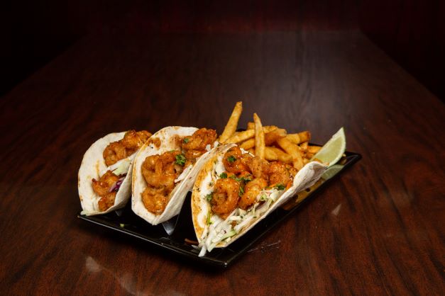 Order Volcano Shrimp Tacos food online from Black Rock Bar & Grill store, Toledo on bringmethat.com