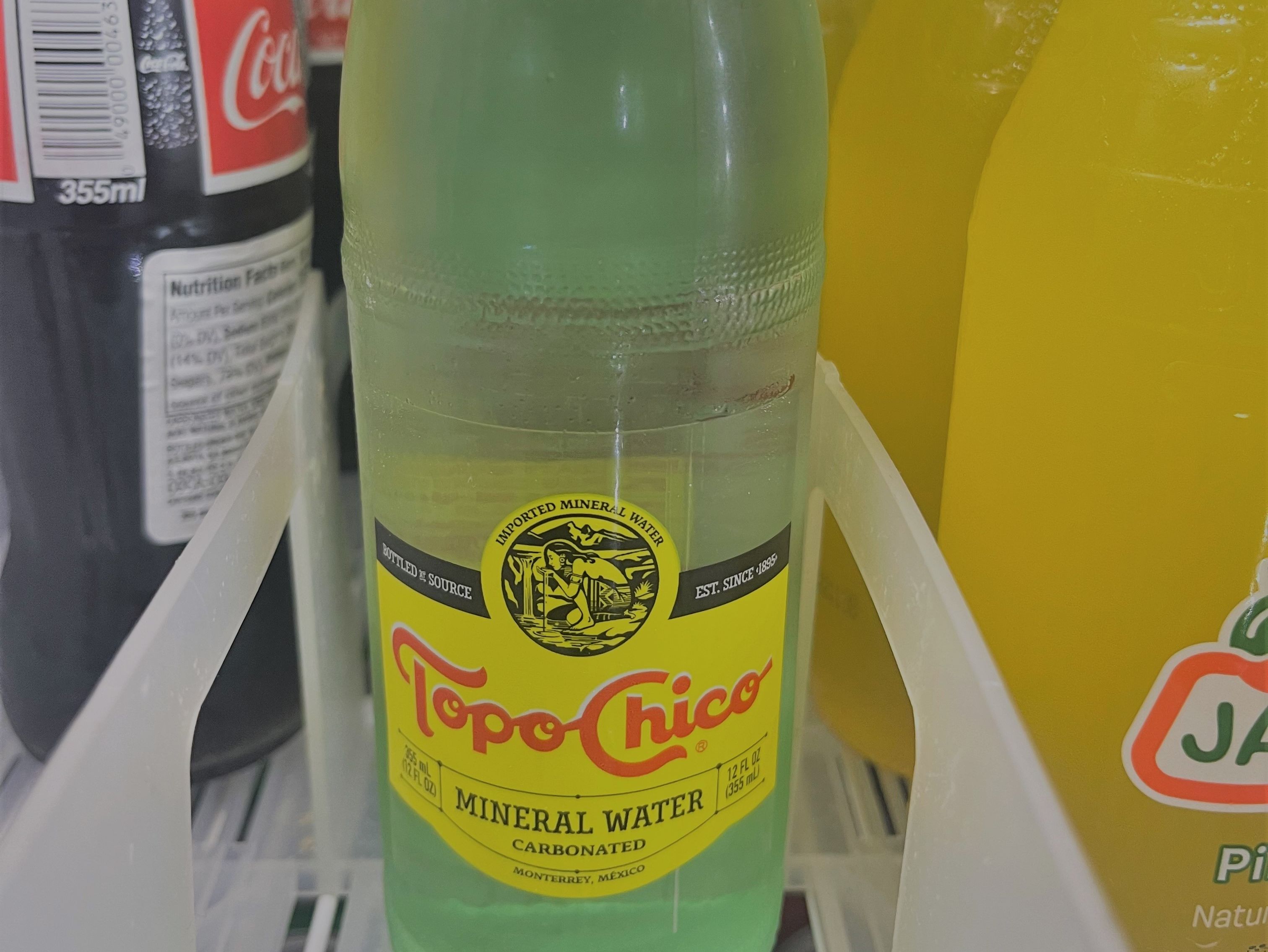 Order TOPO CHICO  food online from Asia Chinese Restaurant store, Austin on bringmethat.com