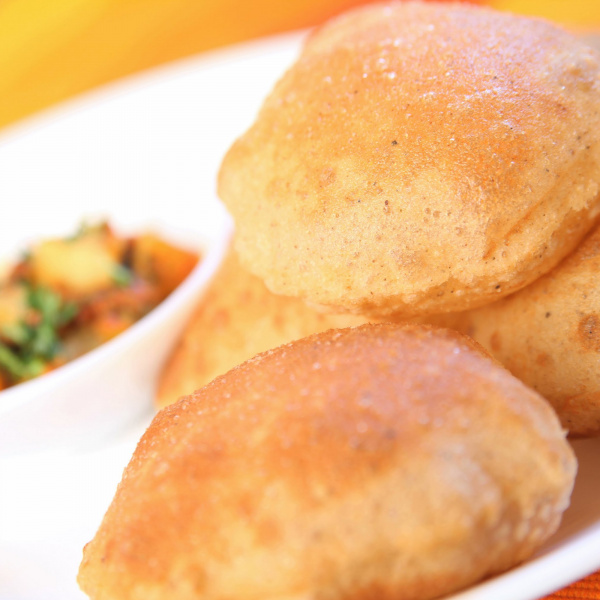 Order Puri food online from Taj Mahal Indian Restaurant store, Dallas on bringmethat.com