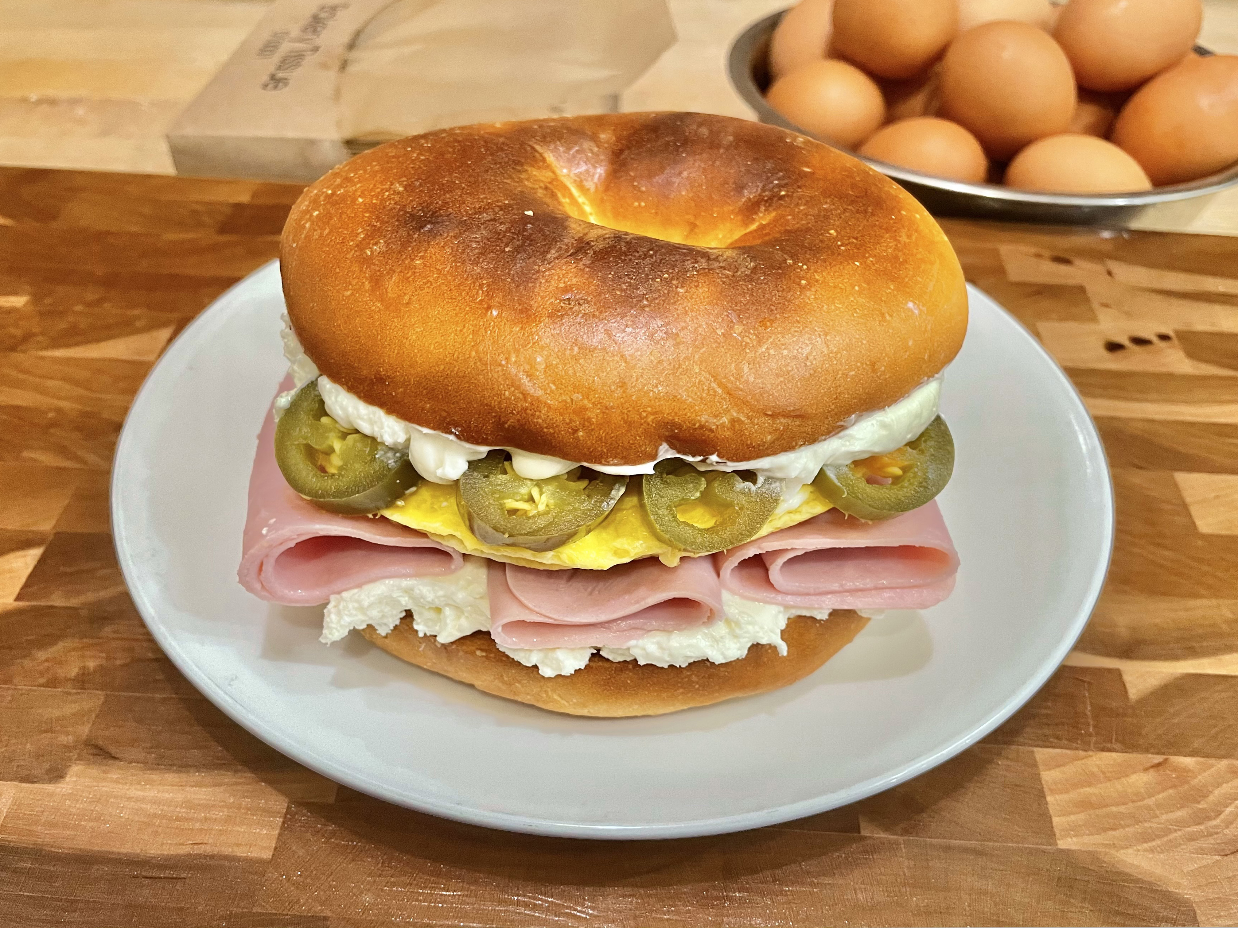 Order Bagel with Cream Cheese, Egg, Ham and Jalapeno Sandwich food online from Glaze Donuts And Bagel Sandwiches store, San Francisco on bringmethat.com