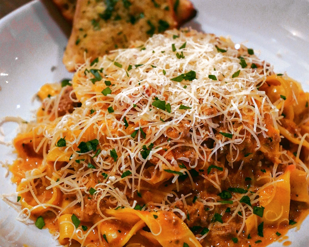 Order Pappardelle Bolognese food online from Burtons Grill store, South Windsor on bringmethat.com