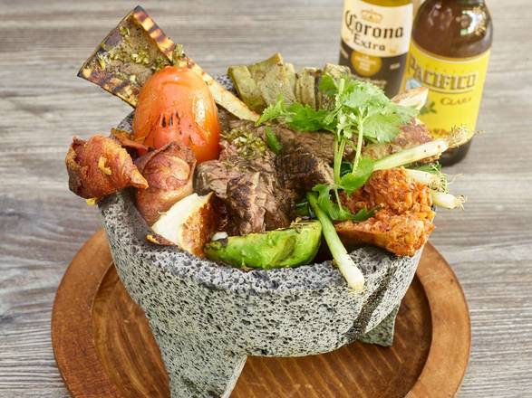 Order Molcajete Mixto Caliente food online from Mariscos Choix store, Downey on bringmethat.com