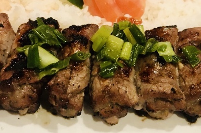 Order 4 pieces of Grilled Sesame Beef (4 cục bò lụi) food online from Hello Saigon store, New York on bringmethat.com