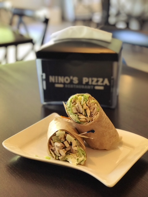 Order Grilled Chicken Caesar Wrap food online from Nino's Pizza & Restaurant store, Hillsdale on bringmethat.com