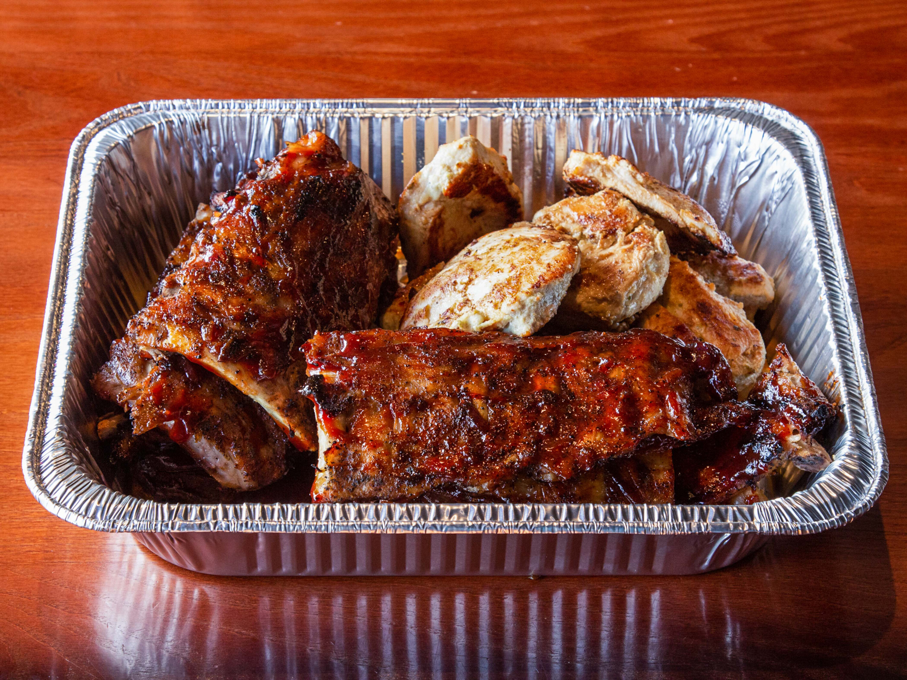 Order Ribs & Chicken Family Pack food online from Kickback Jack's store, Fayetteville on bringmethat.com