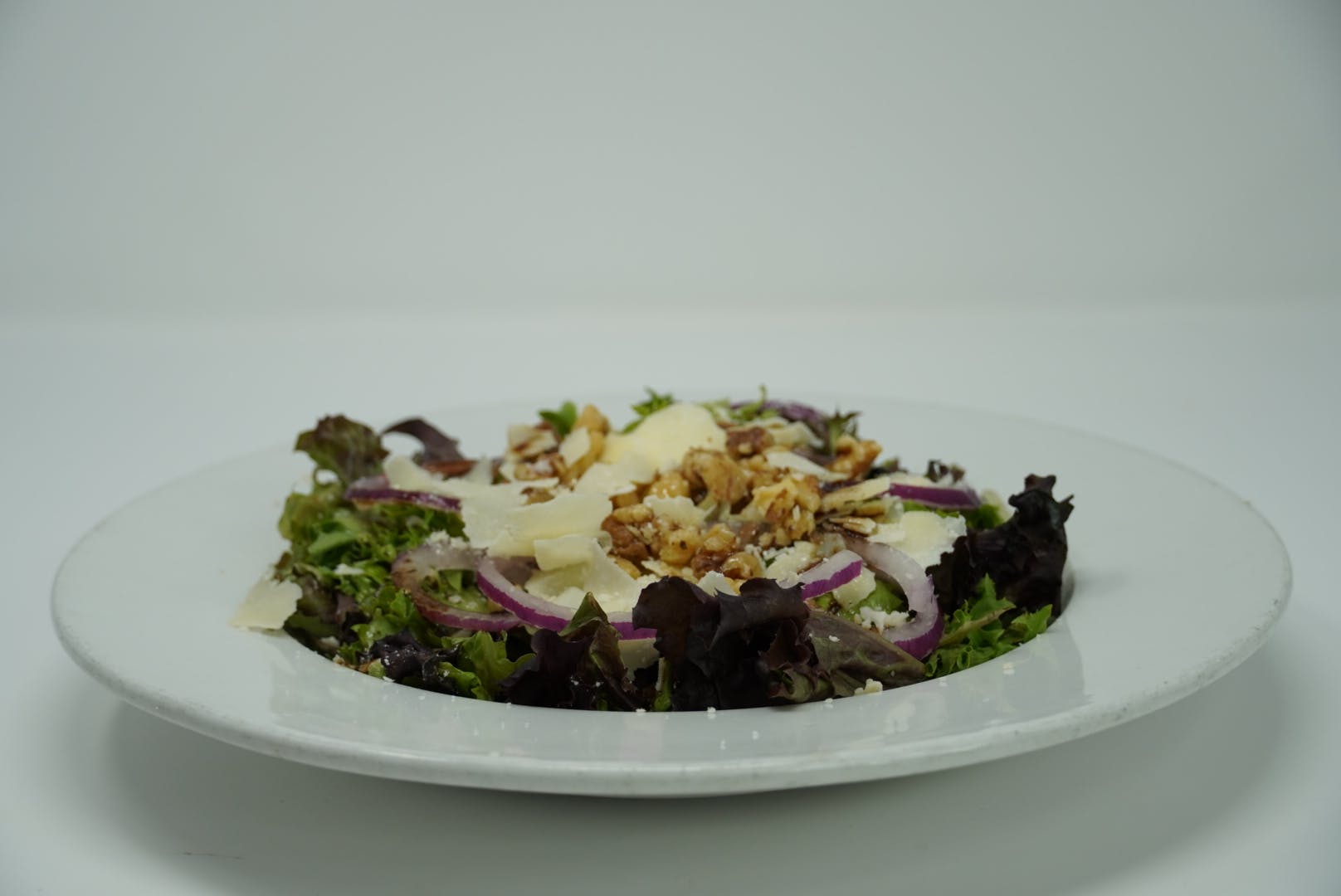 Order Mixed Greens Salad - Salad food online from DeNunzio's Italian Restaurant - Latrobe store, Latrobe on bringmethat.com
