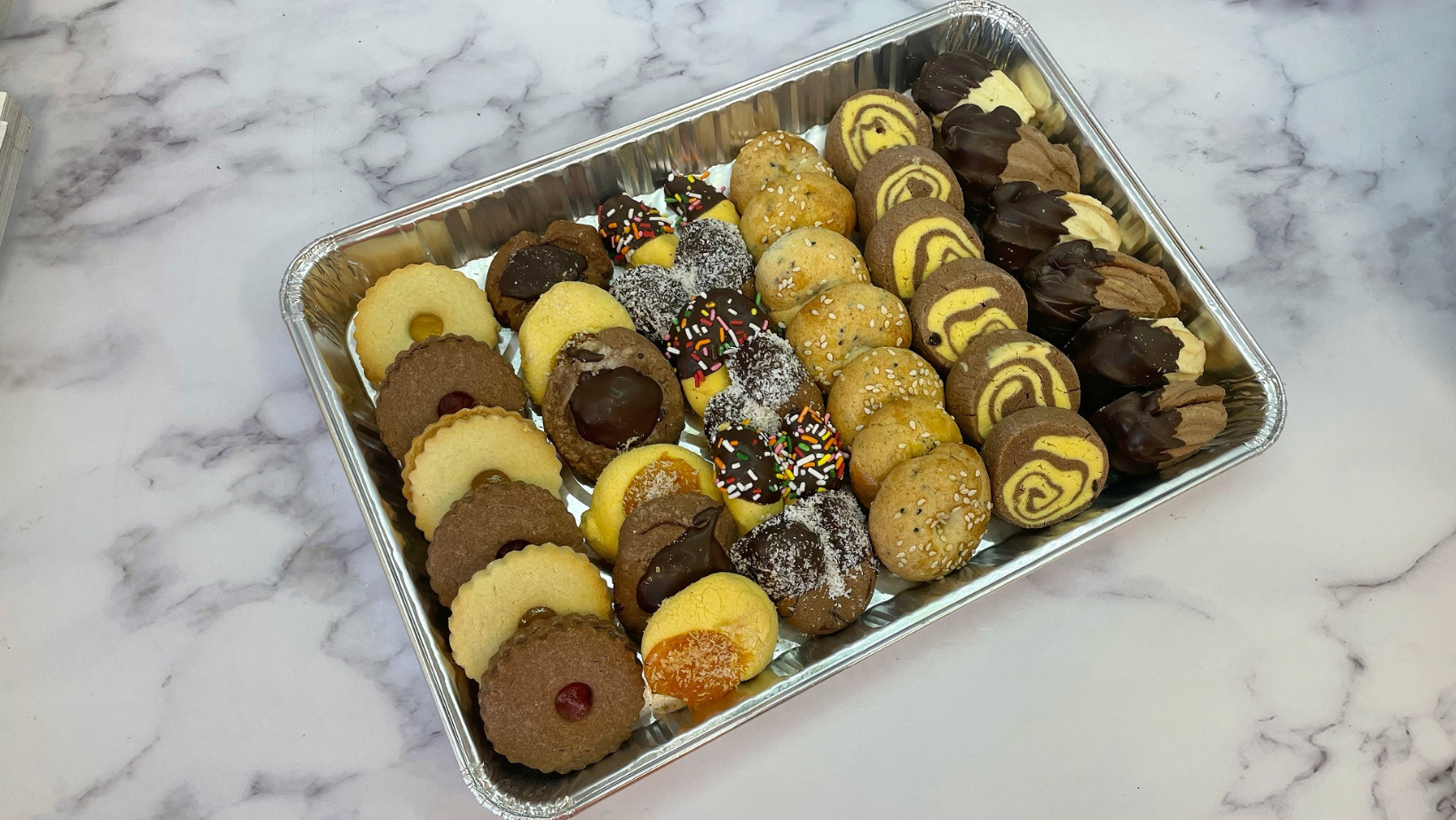 Order 1/4 Sheet Assorted Mixed Cookies food online from Sarkis Pastry store, Pasadena on bringmethat.com