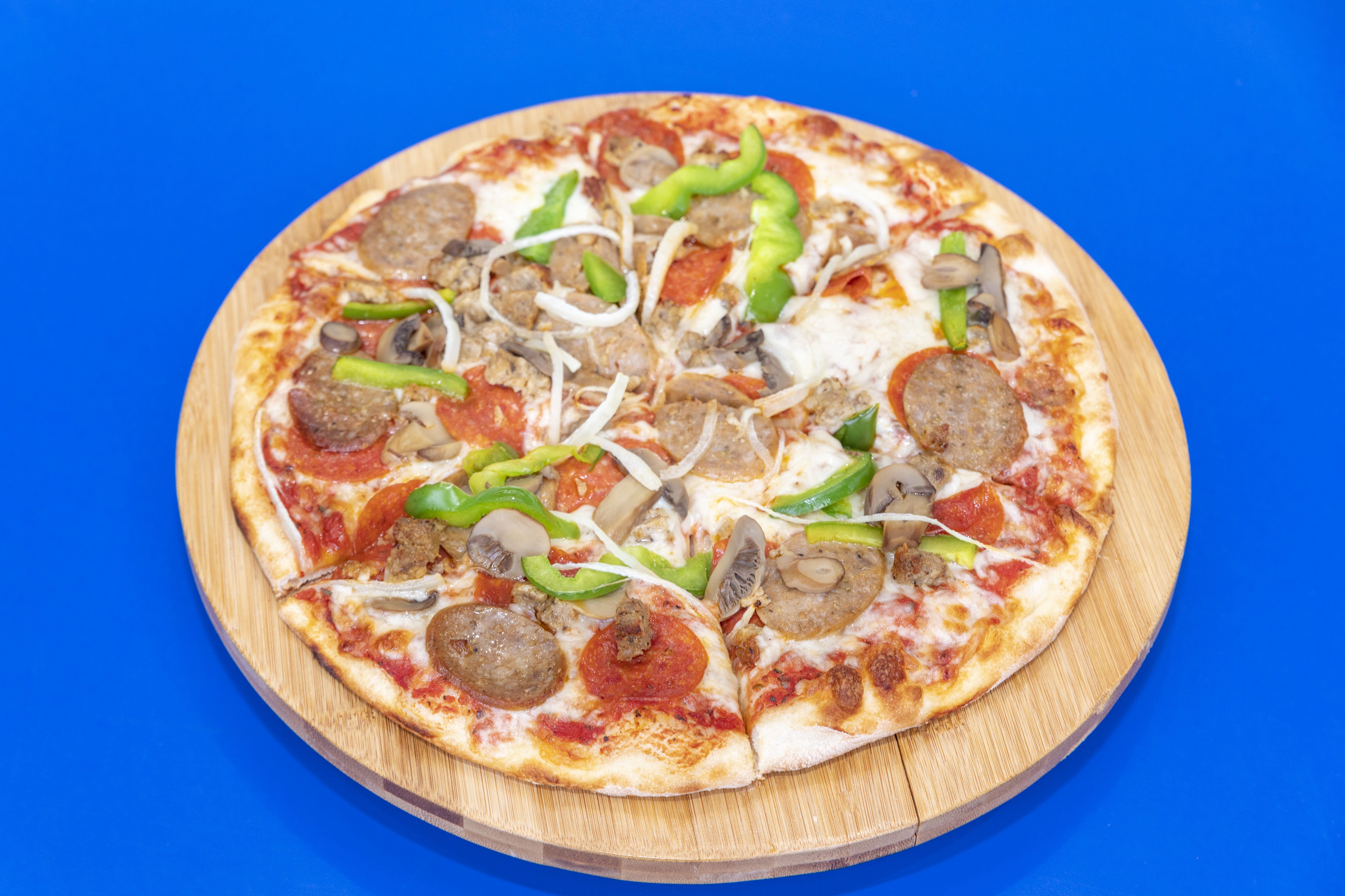Order Veggie Supreme Pizza - Small food online from Four Brothers Pizza store, Westport on bringmethat.com