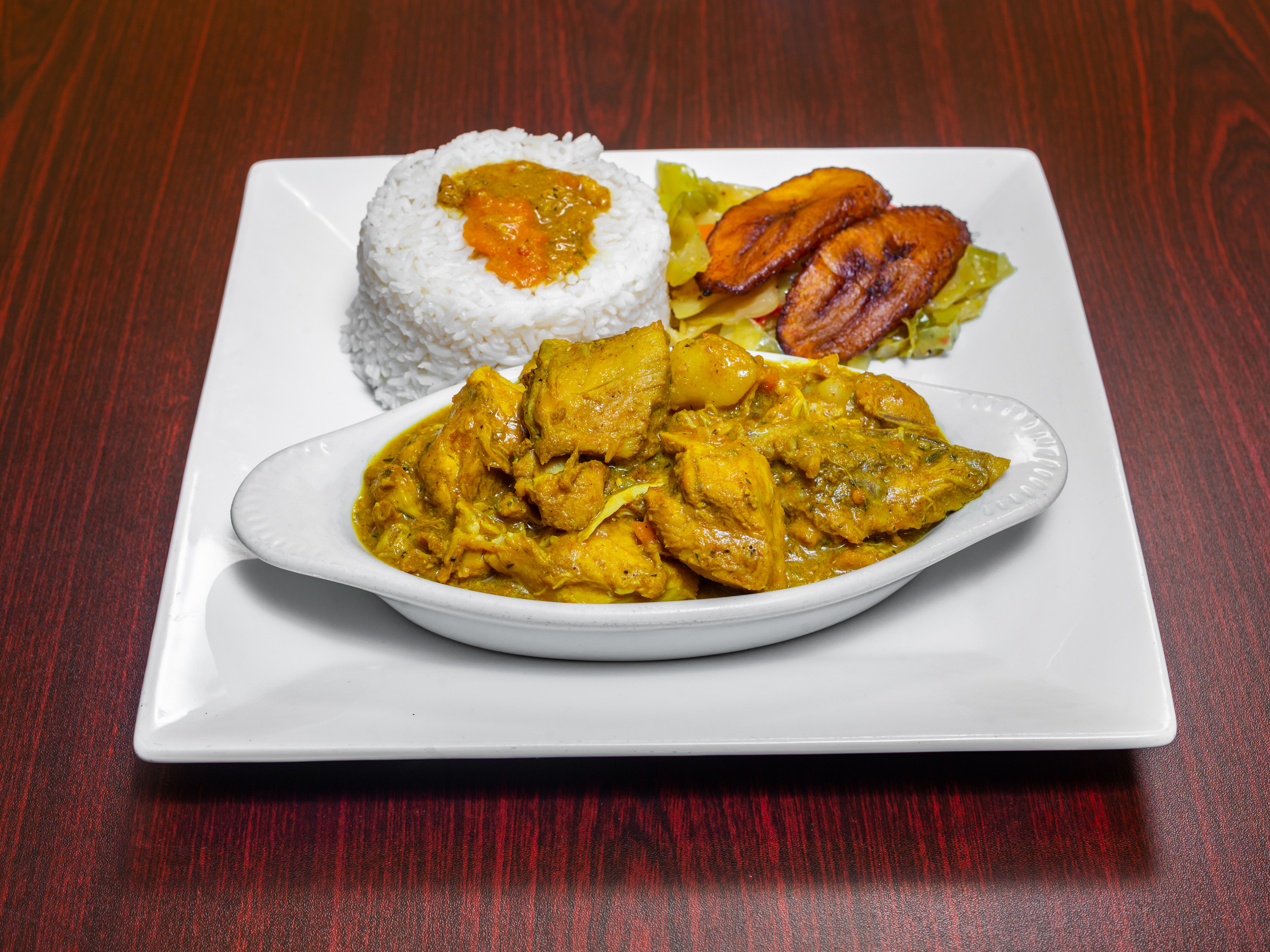 Order Mama's Curry Chicken food online from Malakhi Lounge & Jamaican Restaurant store, Manassas on bringmethat.com