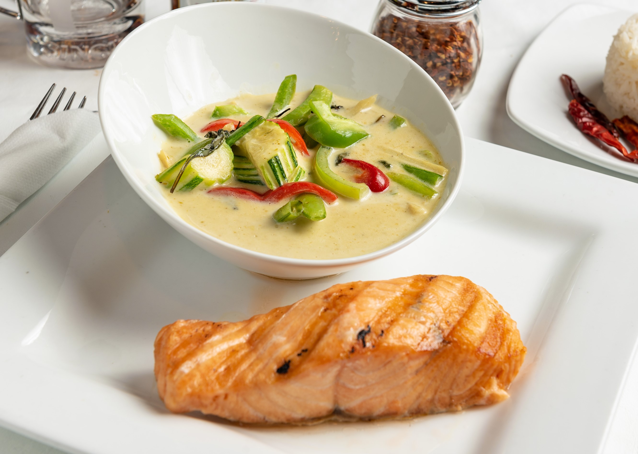 Order Grilled Salmon Green Curry food online from Phuket Thai Restaurant and Sushi store, Huntsville on bringmethat.com