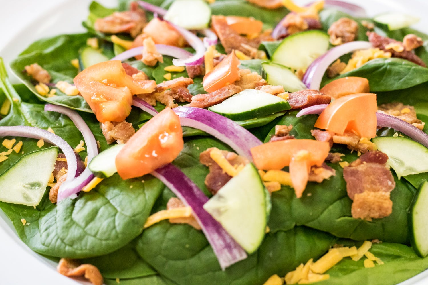 Order Bacon Spinach Salad - Small food online from Happy Pizza store, Manteca on bringmethat.com