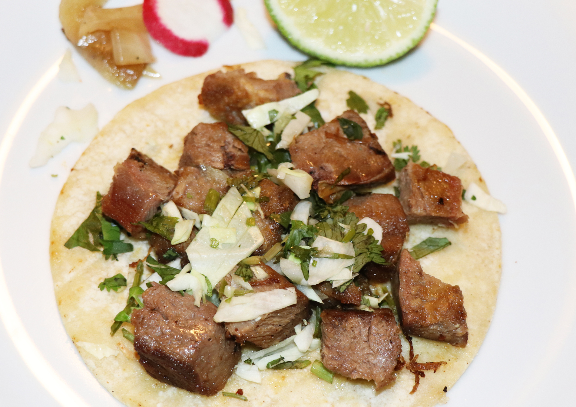 Order Lengua Taco food online from El Paisa Tacos store, Santa Rosa on bringmethat.com