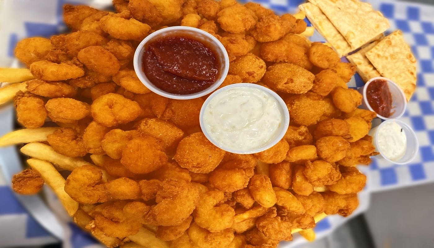 Order Family Popcorn Shrimp Dinner - 2 lb. food online from Village Pizza and Seafood store, Pasadena on bringmethat.com