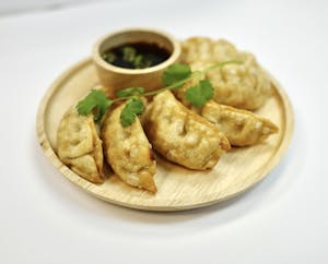 Order 07. Gyoza (Chicken Potsticker) food online from Golden Thai Kitchen store, Phoenix on bringmethat.com