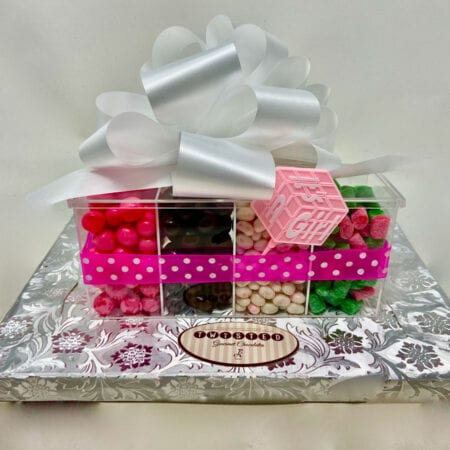 Order Premium chocolate & gourmet confection four section acrylic baby girl gift box with lid. food online from Twisted Gourmet Chocolates store, Passaic on bringmethat.com
