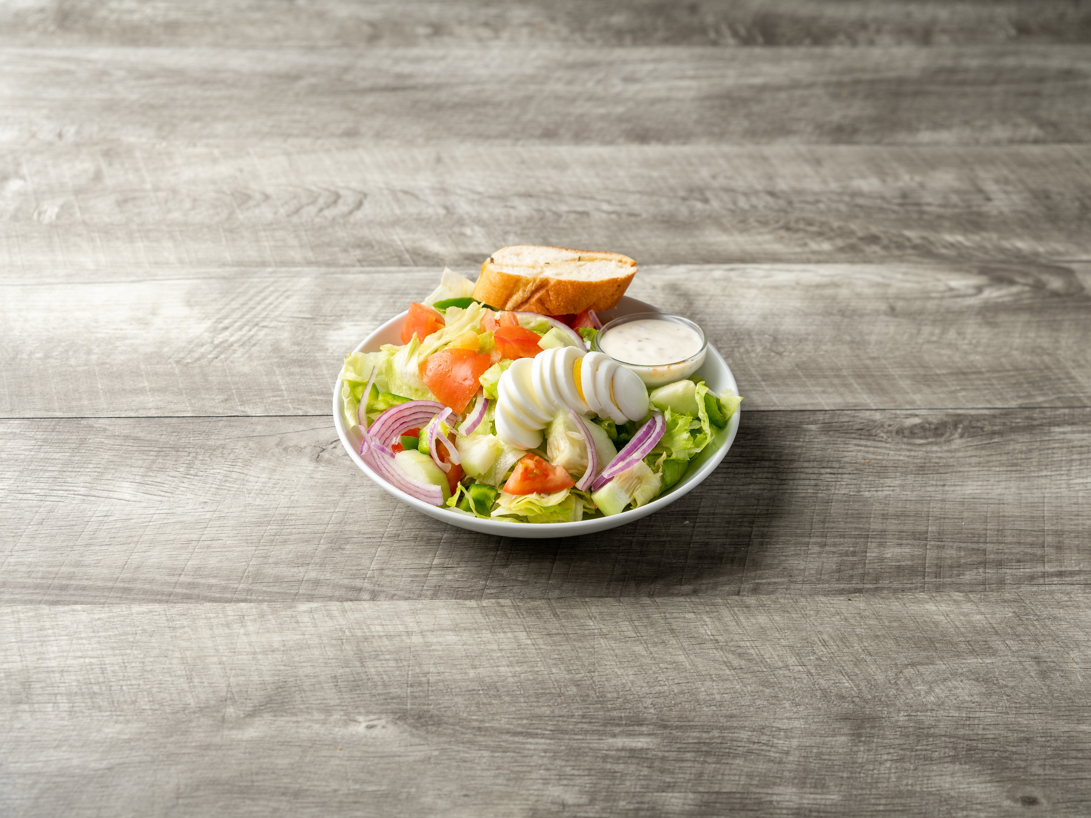 Order Tossed Salad food online from New Station Pizza store, Lansdale on bringmethat.com