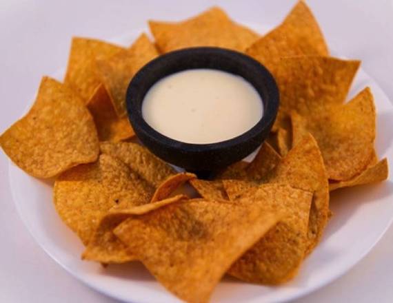 Order Cheese Dip (8 oz) food online from La Poblanita Mexican Restaurant store, Charlotte on bringmethat.com