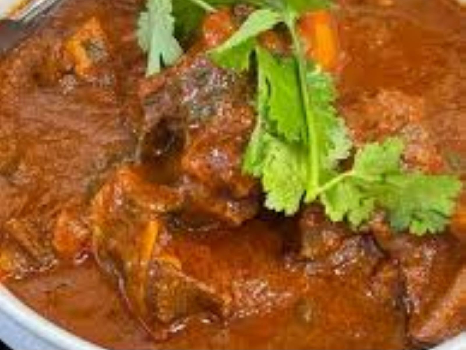 Order Goat Madras (HALAL) food online from Passage to India store, Cambridge on bringmethat.com