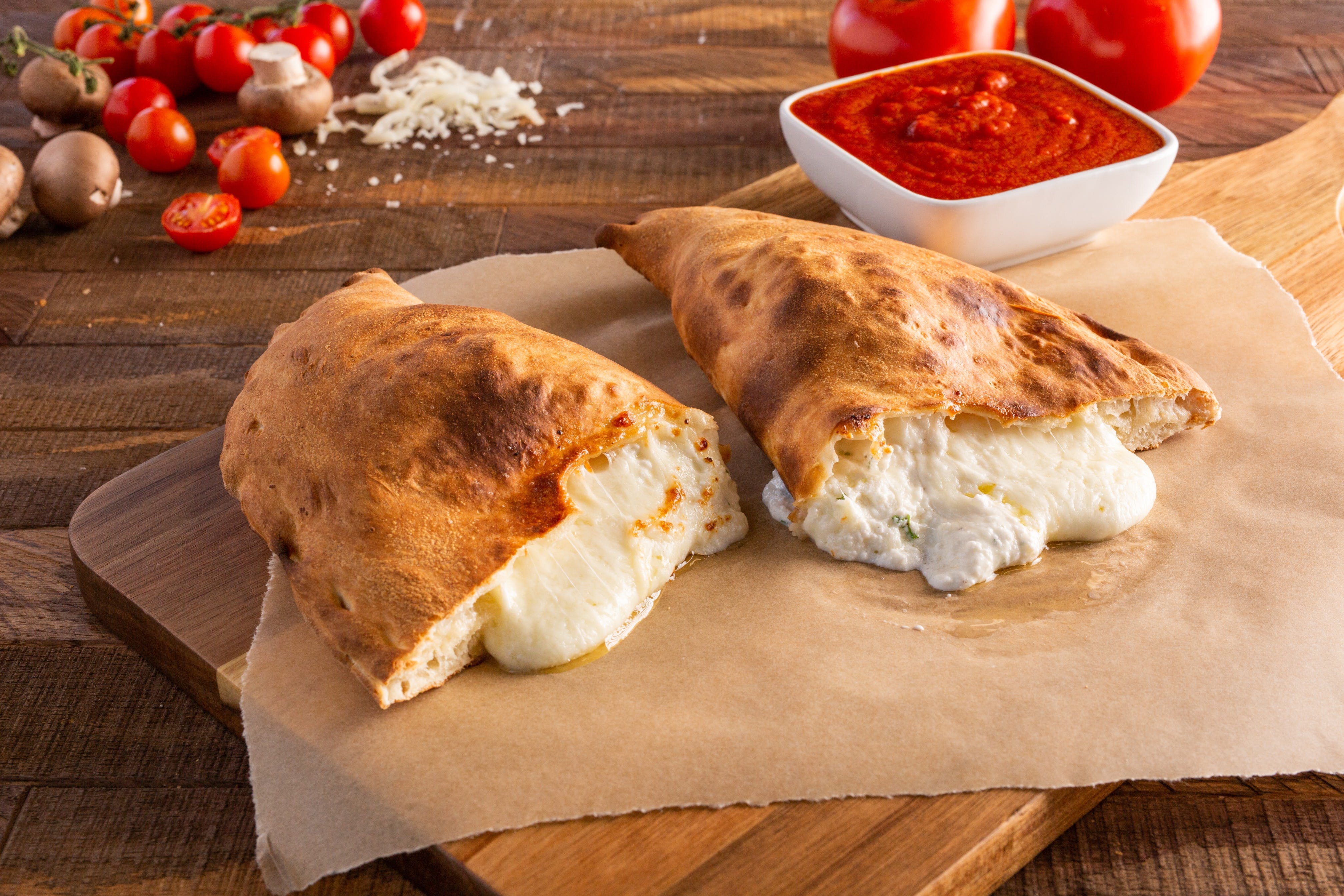 Order Cheese Calzone - Calzone food online from Ameci Pizza & Pasta store, Glendale on bringmethat.com