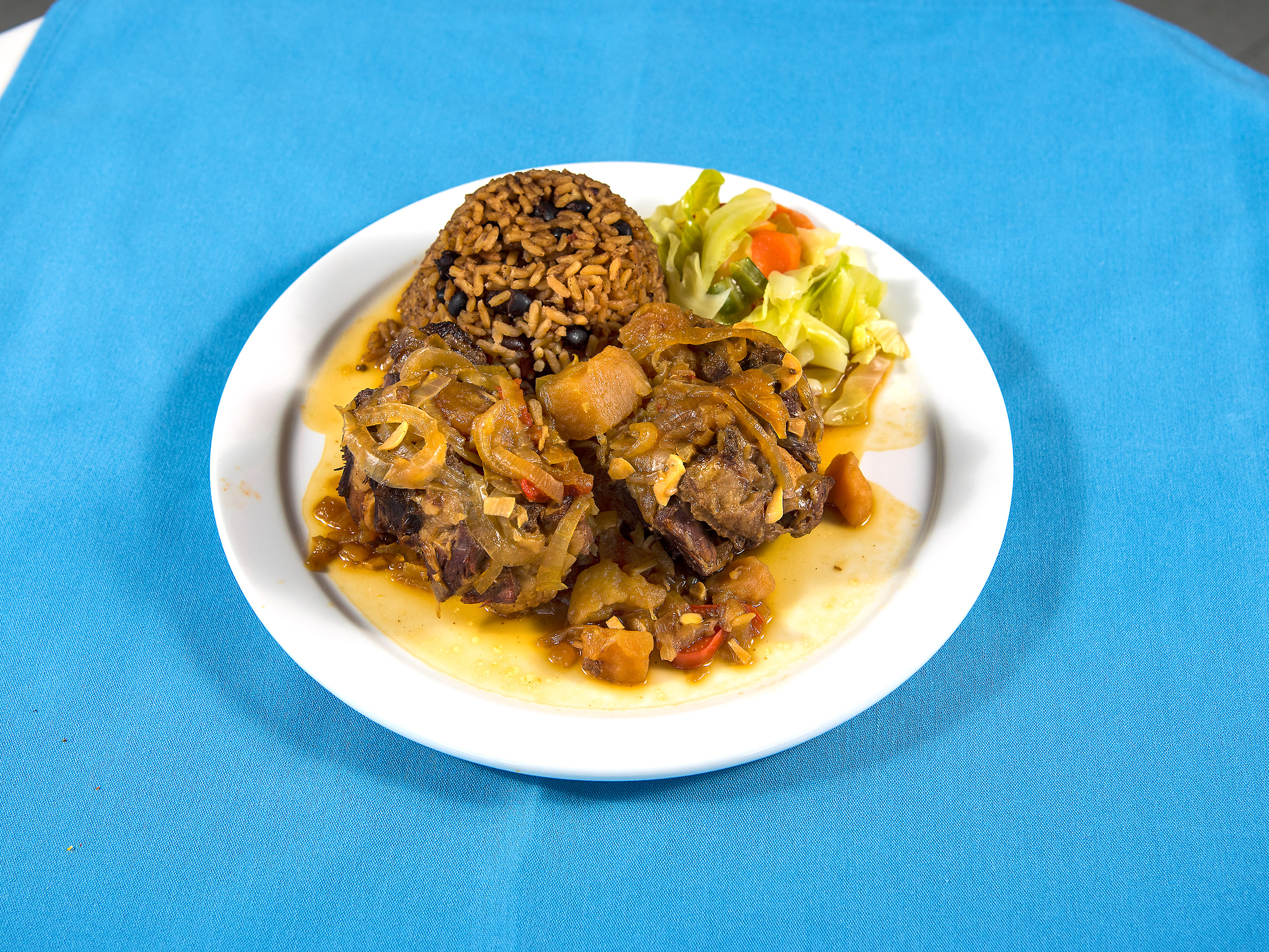Order Oxtail food online from Taste Of The Cribbean store, Albuquerque on bringmethat.com