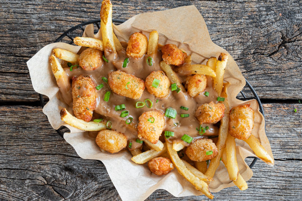 Order Poutine (Limited Time Offer) food online from Native Grill & Wings store, Tempe on bringmethat.com