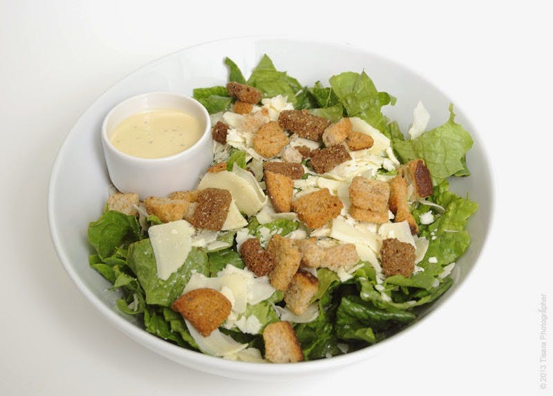 Order Caesar Salad - Side food online from Monterey's Pizza store, Alexandria on bringmethat.com