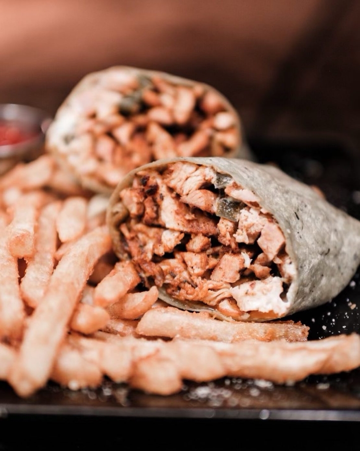 Order Spicy Cajun Chicken Wrap food online from The Downtown Cafe store, Glen Cove on bringmethat.com