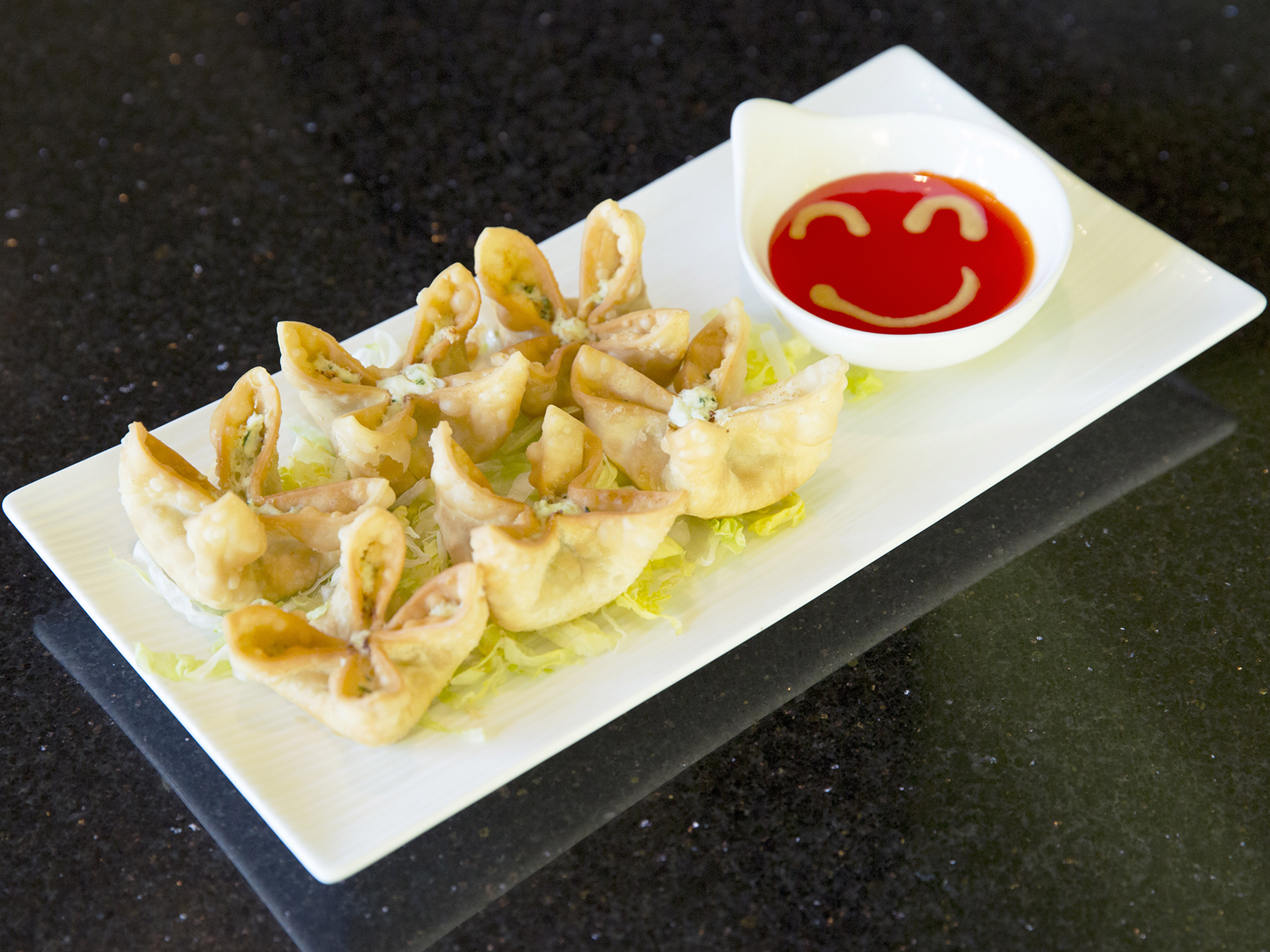Order 6 Spinach Cheese Wontons food online from Spicy Basil store, Englewood on bringmethat.com