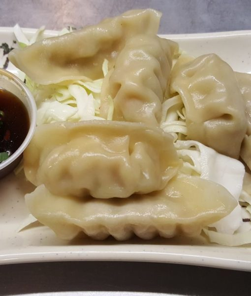 Order S34. Dumplings food online from Asia Bowl & Grill store, Fort Worth on bringmethat.com