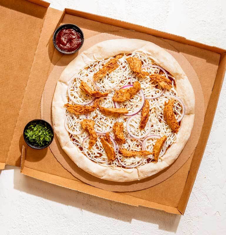 Order Take and Bake Plant-Based BBQ Chicken Pizza food online from California Pizza Kitchen - River City Dr store, Jacksonville on bringmethat.com