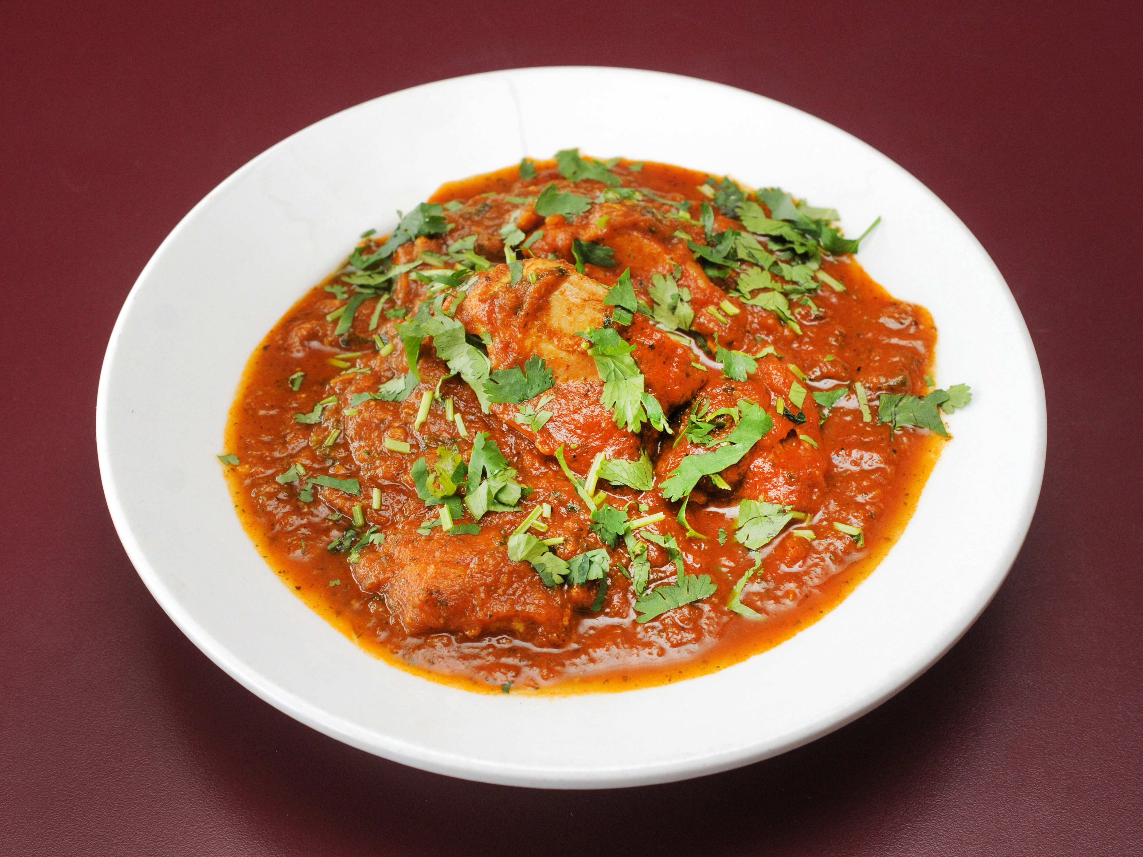 Order Chicken Curry food online from Friends Indian Restaurant store, Lodi on bringmethat.com