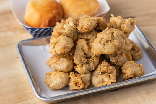 Order Fresh Gizzards 1 lb. food online from Ezells Famous Chicken store, Woodinville on bringmethat.com