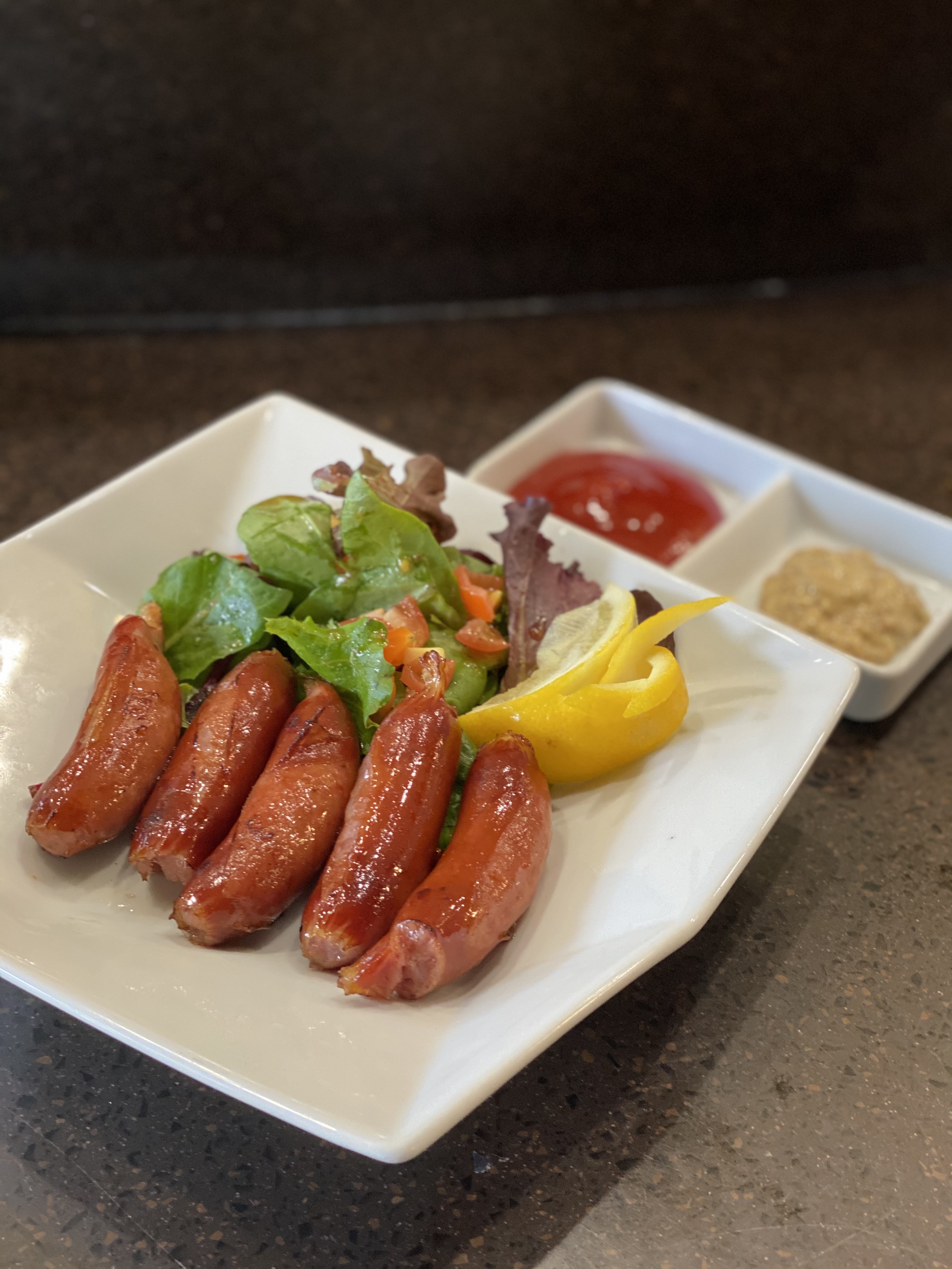 Order Kurobuta Sausage food online from Kanpai Japanese Sushi Bar and Grill store, Los Angeles on bringmethat.com