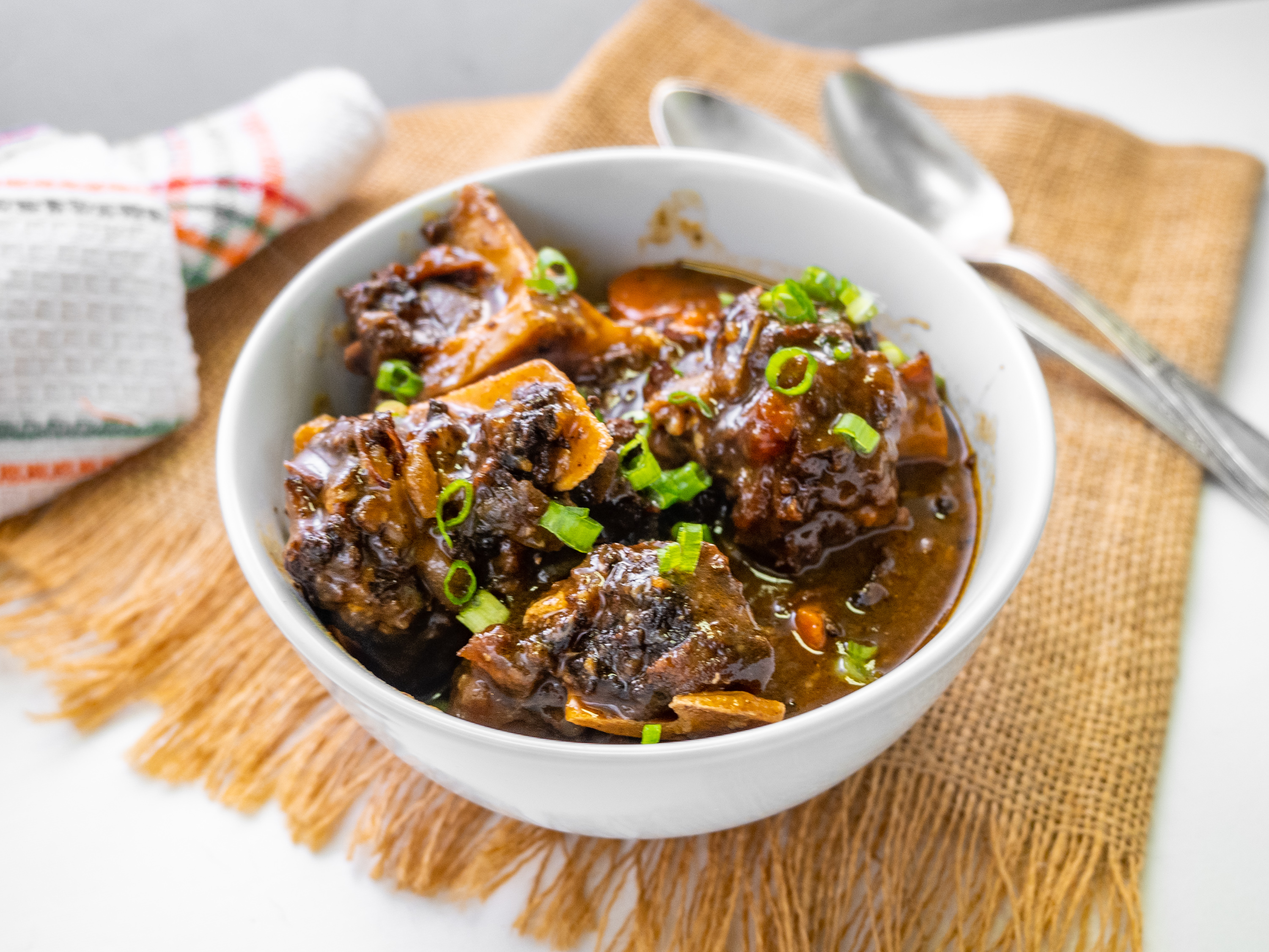 Order Oxtail food online from Grapes Real Jamaican Cuisine store, Wilmington on bringmethat.com
