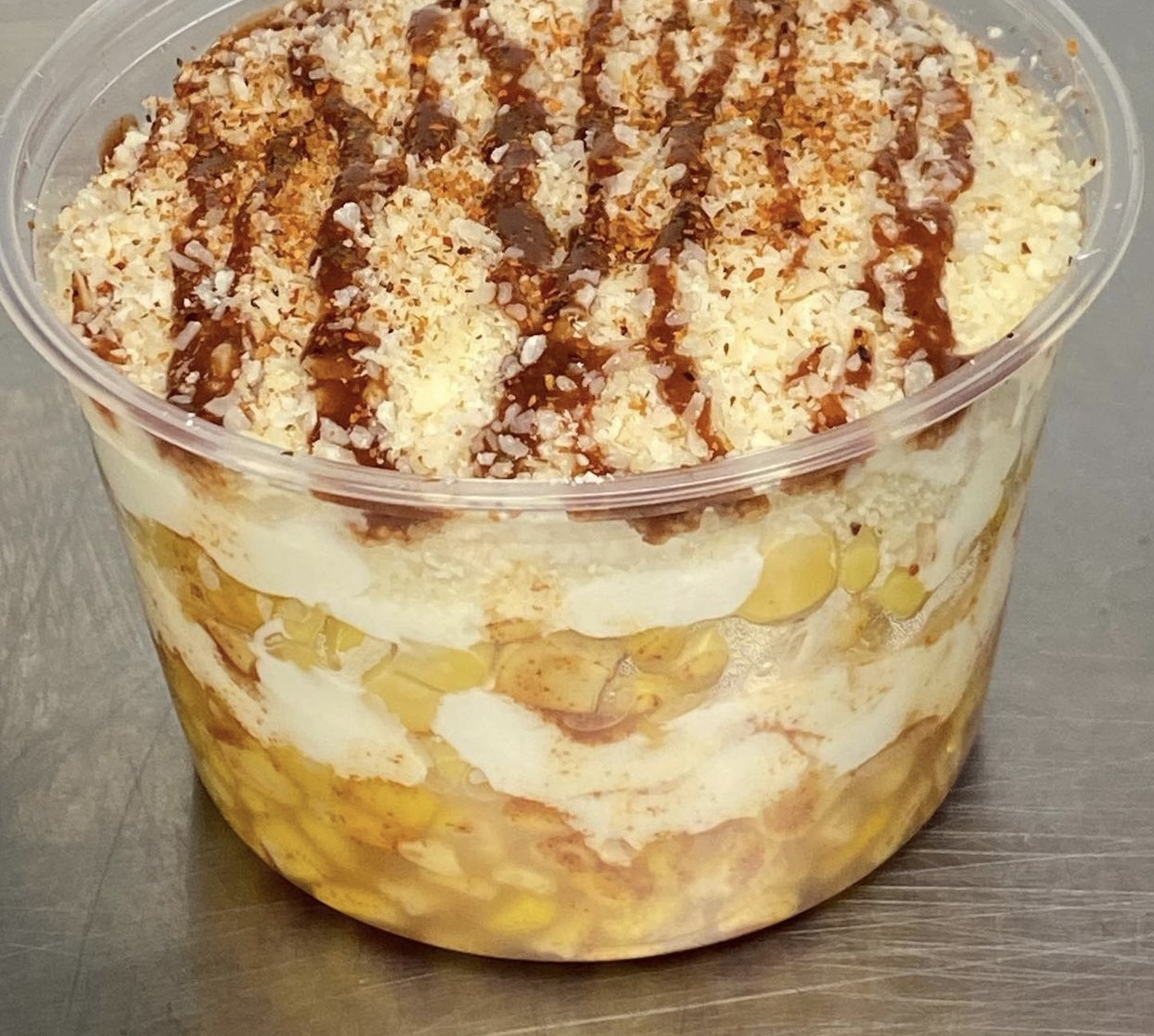 Order Elote in a Cup food online from Cervantes Mexican Kitchen store, Anaheim on bringmethat.com