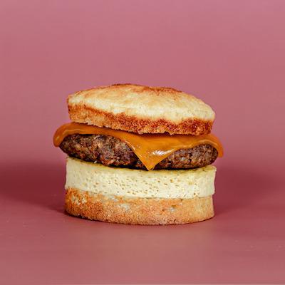 Order Sausage, Cheddar and Egg Breakfast Sando food online from Too Sweet Cakes store, Bend on bringmethat.com