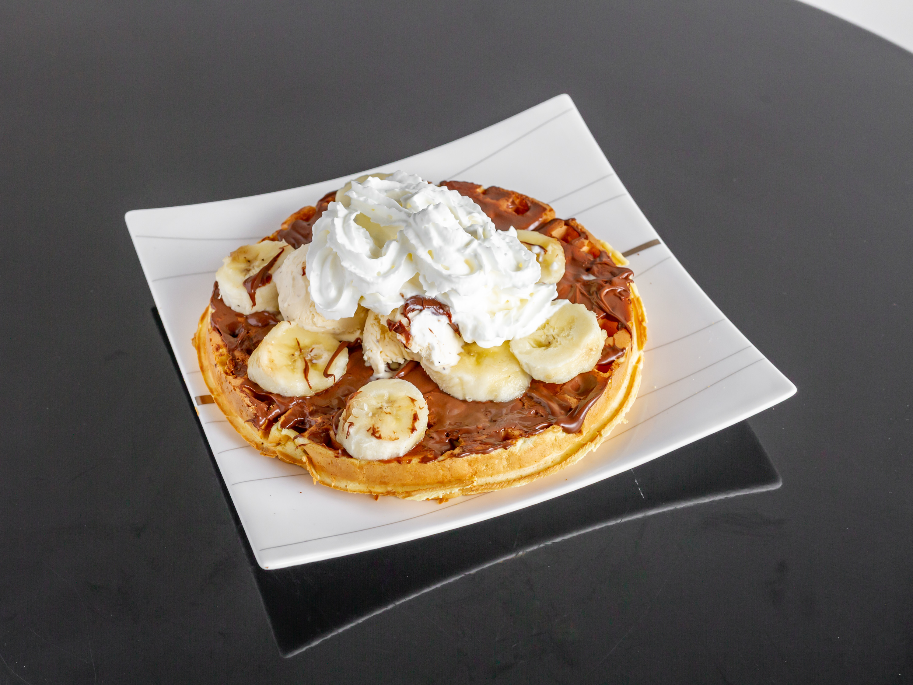 Order Nutella Waffles food online from Columbia Cafe store, Elkridge on bringmethat.com