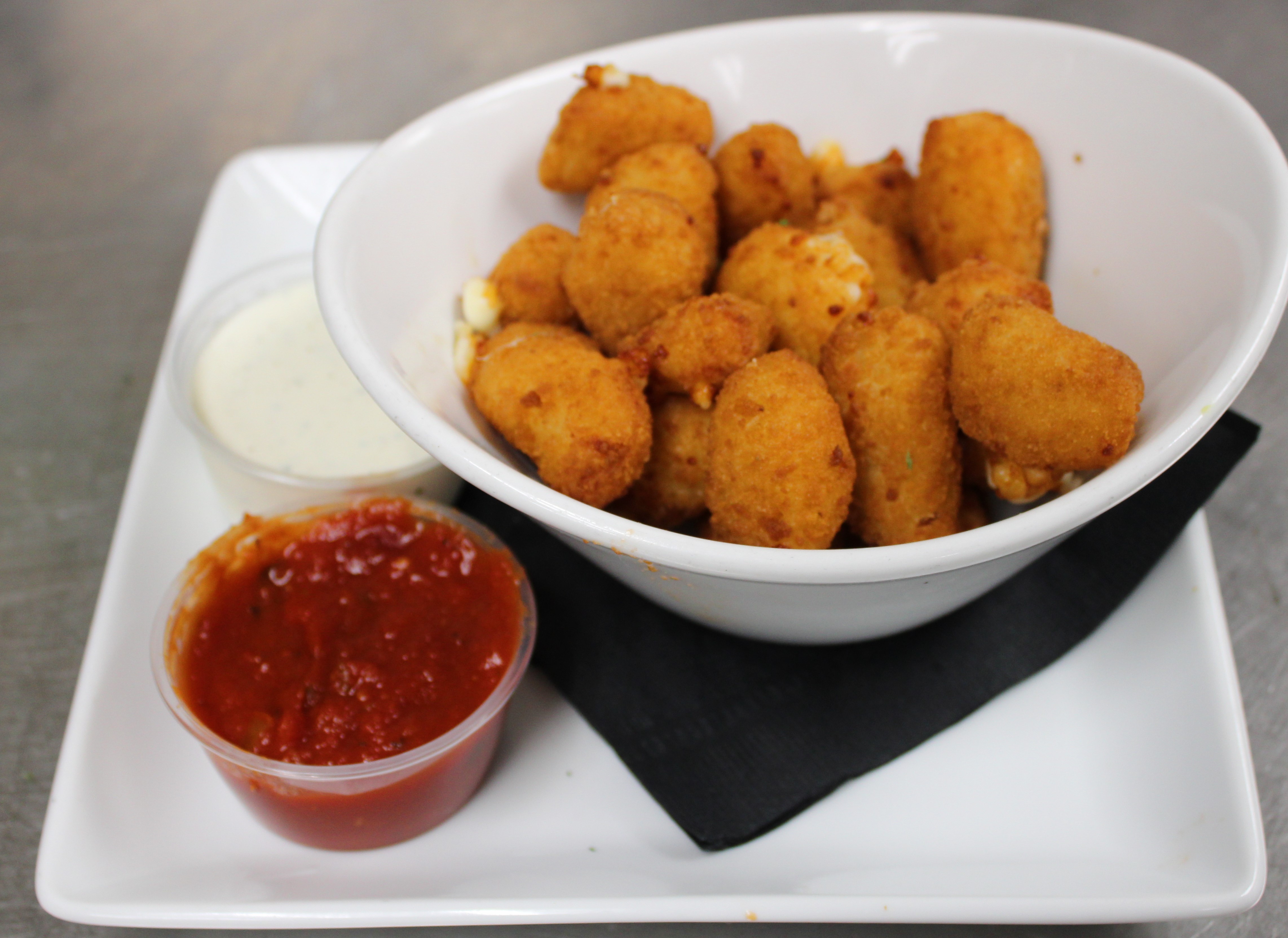 Order Wisconsin Cheese Curds food online from High Park Tap House store, Mission Viejo on bringmethat.com