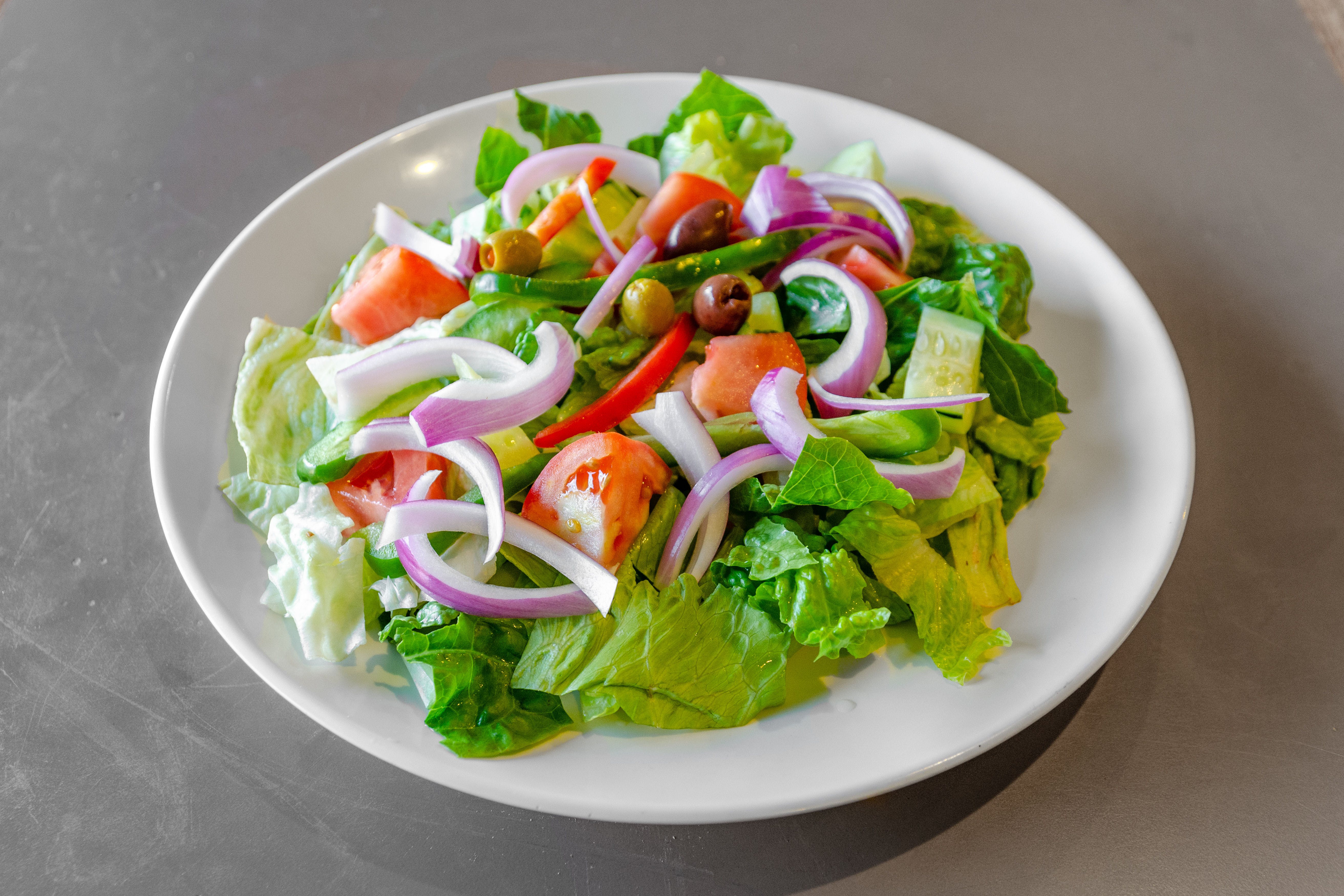 Order Tossed House Salad - Salad food online from Piazza pizza store, Astoria on bringmethat.com