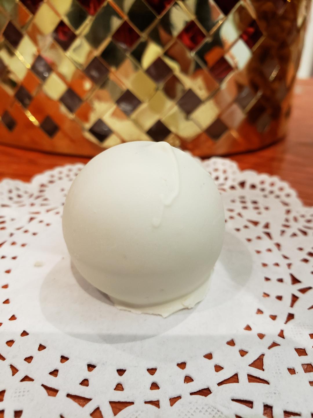 Order Snowball Truffle food online from Rocky Mountain Chocolate Factory store, Winston-Salem on bringmethat.com